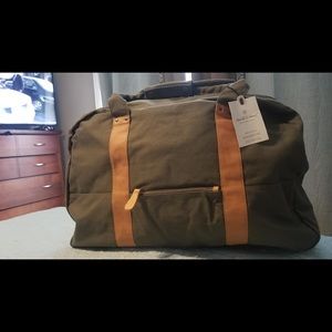 Stylish and sturdy, leather and canvas bag.